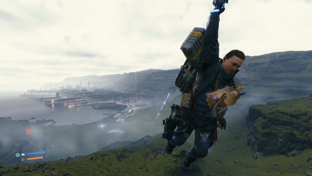 Sam Porter-Bridges flies toward the camera on a zipline, as a city disappears into the background.