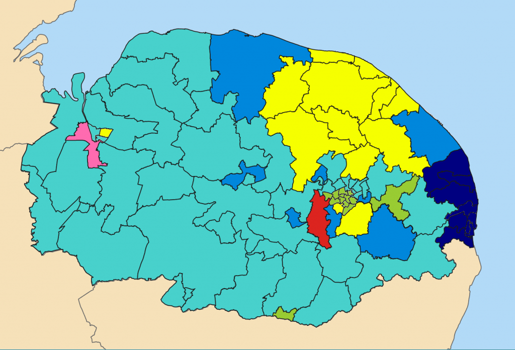 A map of Norfolk's council electoral wards, with areas coloured for the party that won them. The majority of the area is teal, representing Reform, with significant patches of yellow, dark blue and medium blue, with smaller areas of red, green and pink.